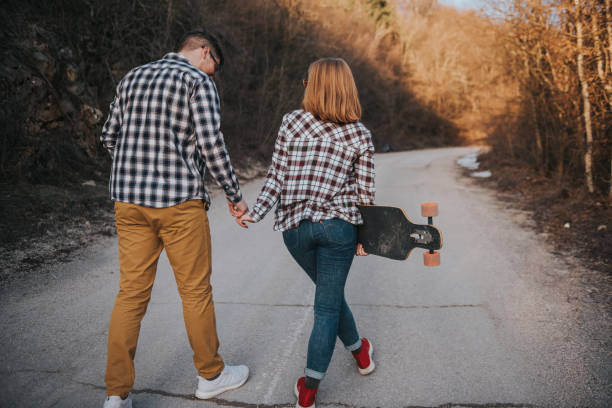 istock Skate couple outdoors stock photo 1303387757