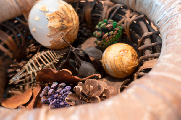 istock Decoration with dried plants in wicker basket 1303388549