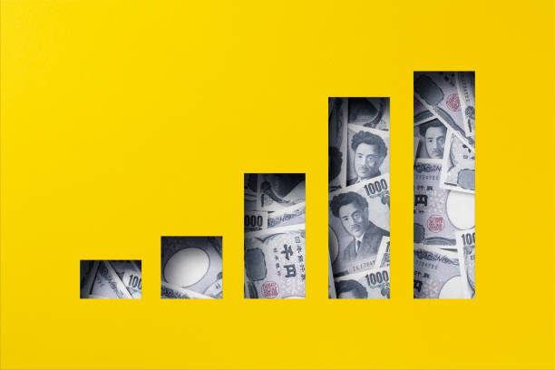 istock Japanese yen heap under paper cutout bar graph icon 1303390294