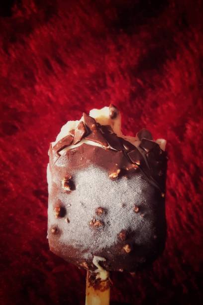 istock a piece of chocolate ice cream on a red carpet background 1303390302