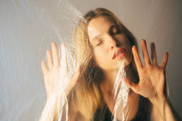 istock peaceful woman defocused art portrait isolation 1303392116
