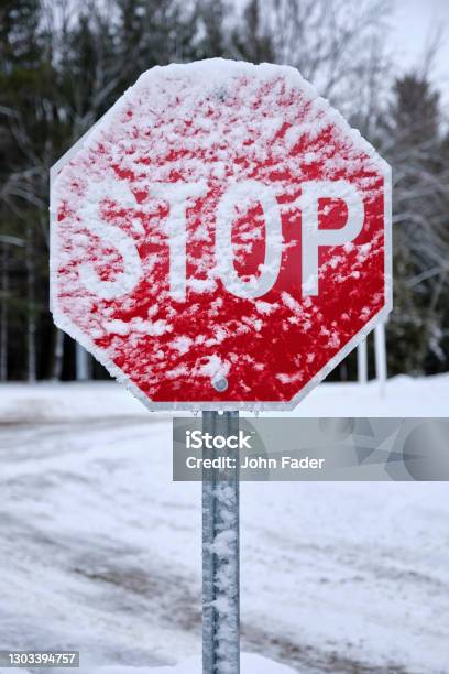 Stop Sign Covered In Snow Stock Photo - Download Image Now - Bright, Canada, Close-up