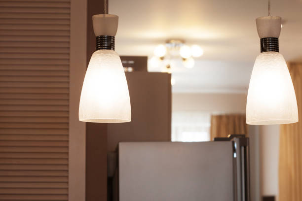 istock small sconce lamp, close up picture, warm tones 1303394804