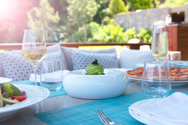 istock Summmertime Dinner tables near the sea 1303395720