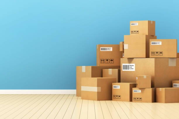 istock Cardboard boxes package delivery carton stock photo on tile background 1303399453
