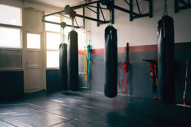 istock Gym room with heavy bags 1303402104