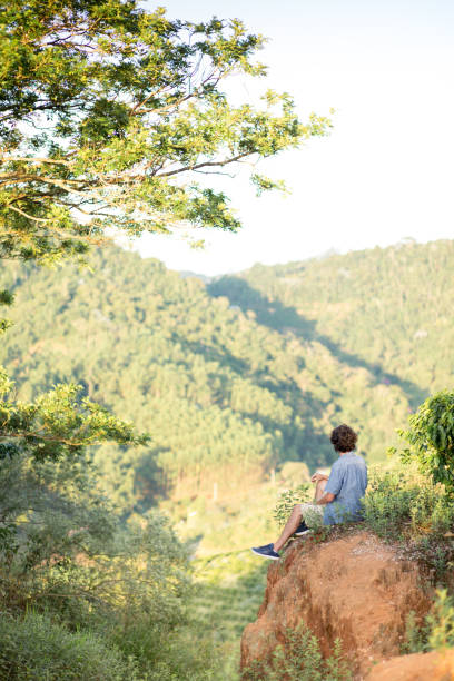istock Sitting on the top of a mountain. 1303404561