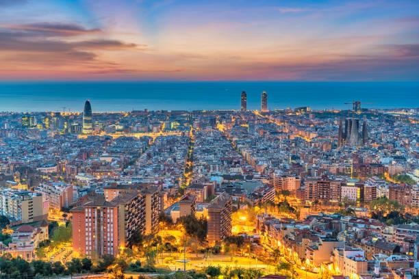 istock Barcelona Spain, high angle view night city skyline from Bunkers del Carmel 1303417054