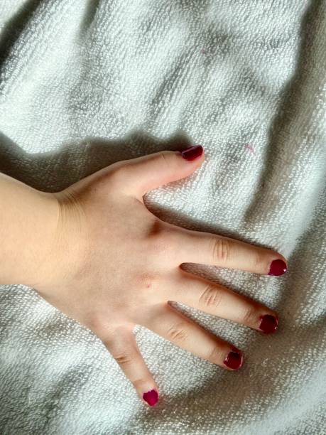 istock Girl First Manicure 1303419337