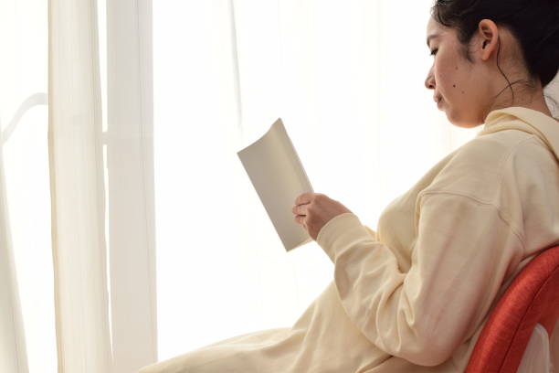 istock pregnant woman reading a book 1303420290