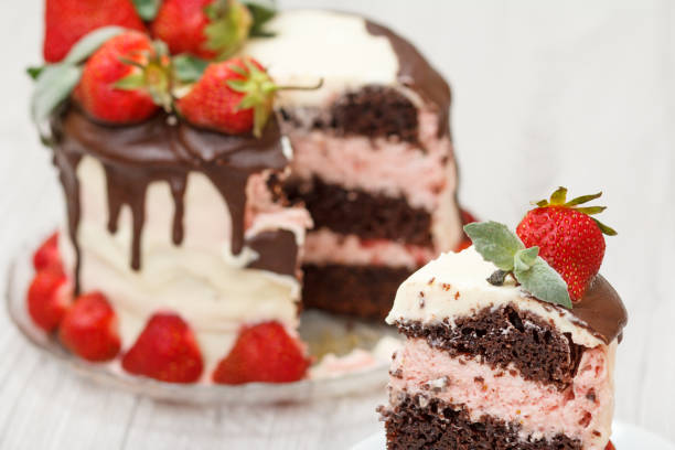 istock Homemade chocolate cake decorated with fresh strawberries 1303424163