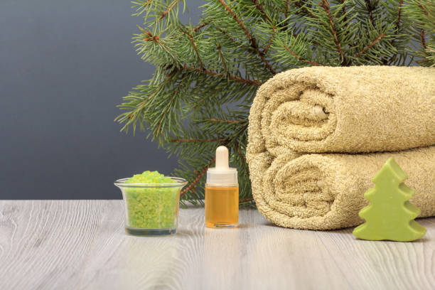istock Composition with soft terry towel and spa products on wooden boards 1303424321
