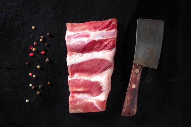 istock Pork ribs, shot from the top on a black background 1303424465
