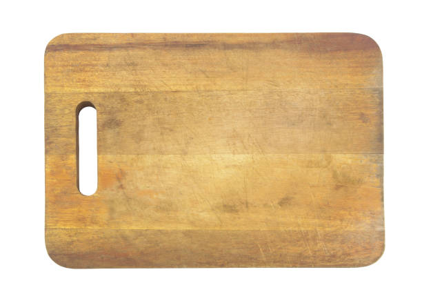 istock Old used rustic cutting board background isolated on white 1303429610