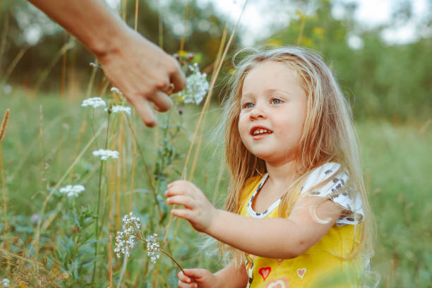 istock child in the garden on a Sunny day 1303431831