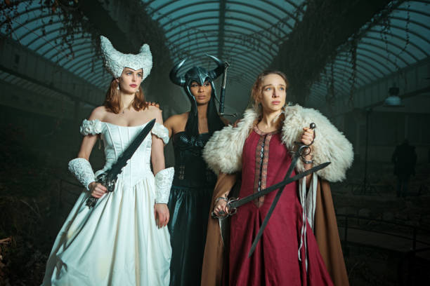 Three fairytale warrior princesses in a unique indoor deserted palace