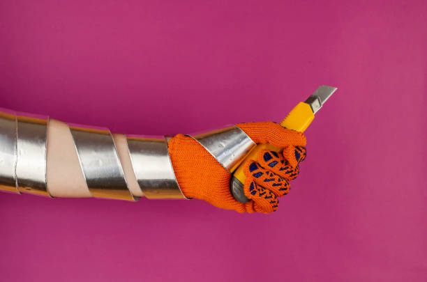 istock Hand wrapped with aluminum duct tape for padding. 1303437357