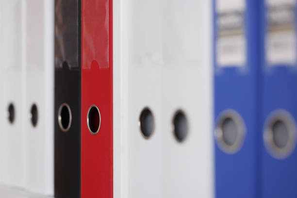 istock Closeup of many document folders in office 1303437443