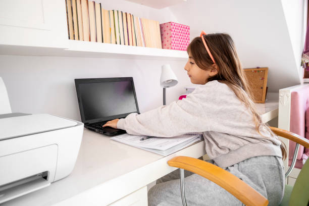 istock Littel girl education at home 1303441698