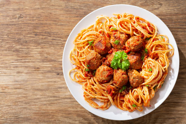 istock plate of pasta with meatballs, top view 1303442538