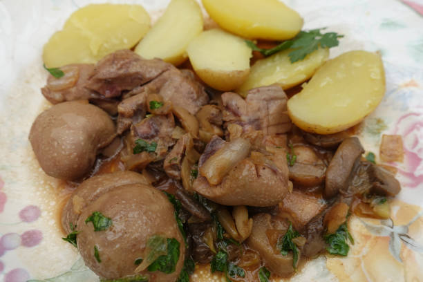 Veal kidney cooked with a Madeira sauce served with Steamed potatoes  French cooking Veal kidney cooked with a Madeira sauce served with Steamed potatoes French cooking madeira sauce stock pictures, royalty-free photos & images
