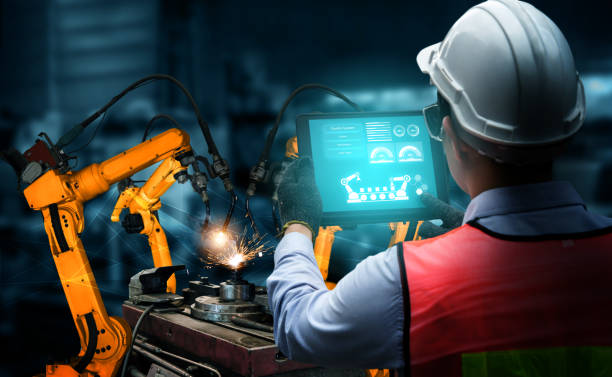 istock Smart industry robot arms for digital factory production technology 1303446429