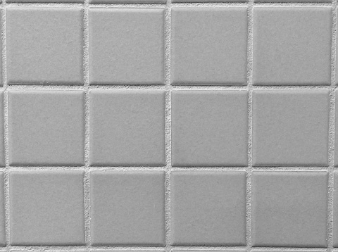 Square plain gray bathroom tiles wall sample. Interior design color swatch section.