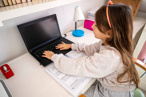 istock Littel girl education at home 1303449027