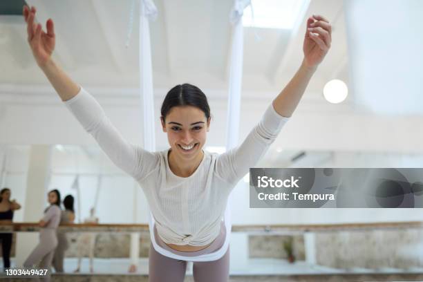 Aerial Yoga Stock Photo - Download Image Now - Aerial Yoga, 18-19 Years, 25-29 Years