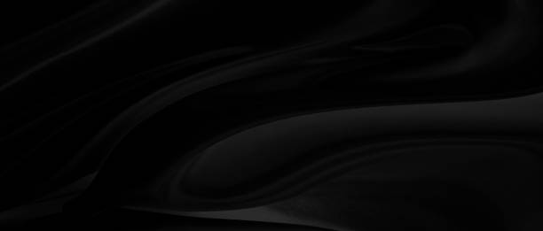 istock Black gray satin dark fabric texture luxurious shiny that is abstract silk cloth panorama background with patterns soft waves blur beautiful. 1303454039