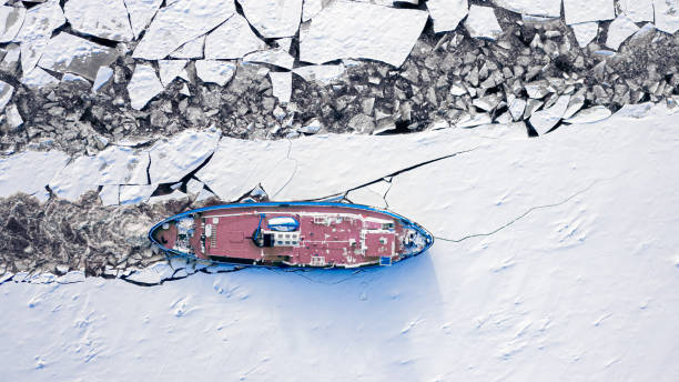 Icebreaker on Vistula river in winter, Plock, Poland Icebreaker on Vistula river in winter, Plock, aerial view of Poland ice floe photos stock pictures, royalty-free photos & images