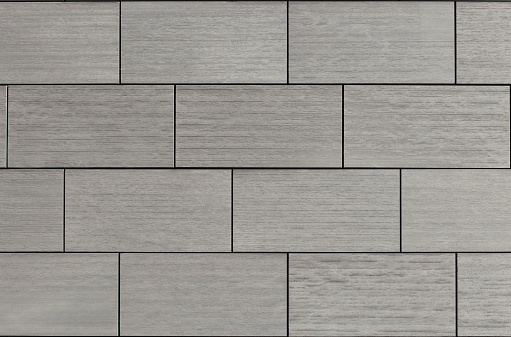 A texture rectangular plates with lines on a modern flat grey surface