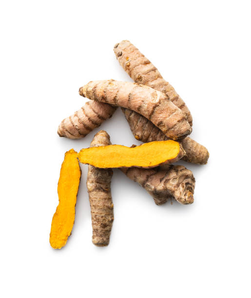 istock Indian turmeric root. Turmeric spice. Yellow turmeric 1303456116
