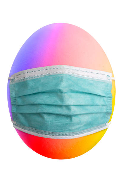 istock easter egg with rainbow colors and mask. 1303457106