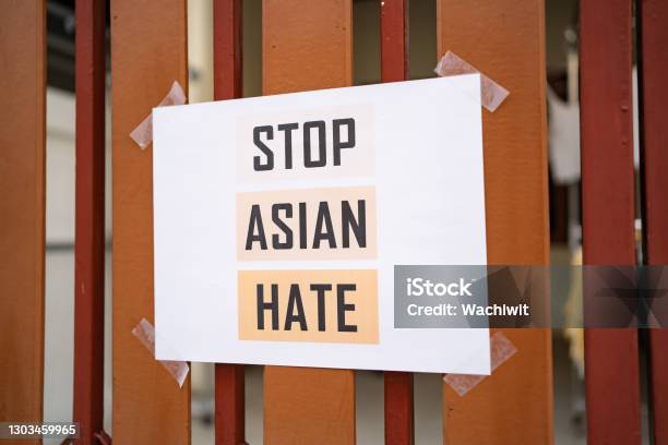 Stop Asian Hate Sign Was Attached On The House Fence Stock Photo - Download Image Now