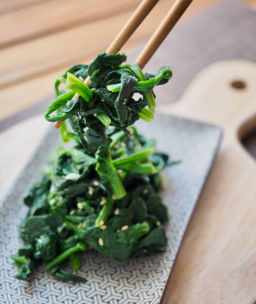 istock Korean traditional food spinach herbs and chopsticks 1303464319