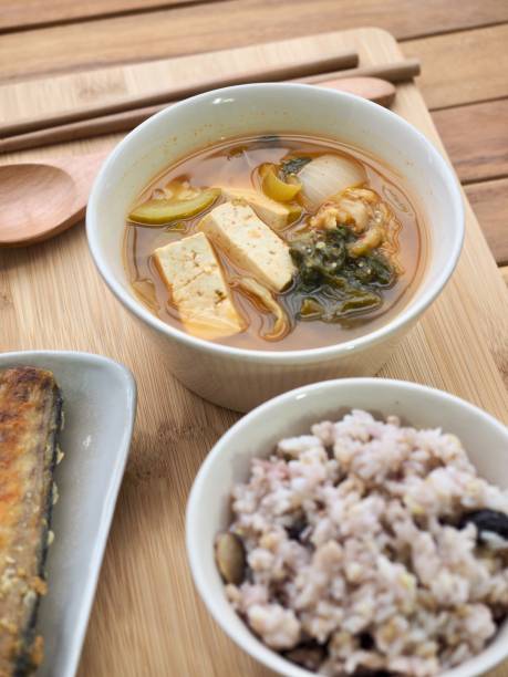 istock Asian food grilled fish, rice, miso soup 1303464328