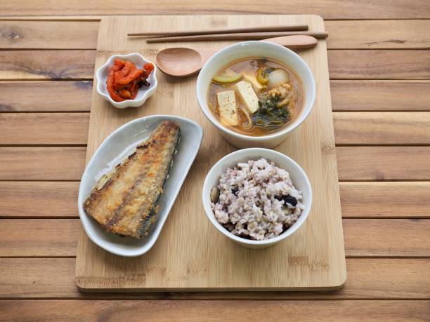 istock Asian food grilled fish, rice, miso soup 1303464361