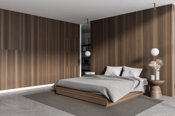 istock Stylish wooden master bedroom corner 1303465758