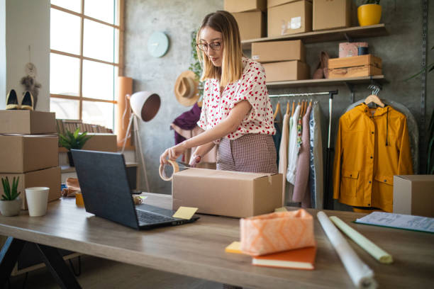 istock Small business owner preparing new orders 1303466283