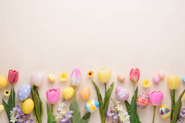 istock Happy Easter day colorful eggs and flower decoration on paper background with copy space 1303466957