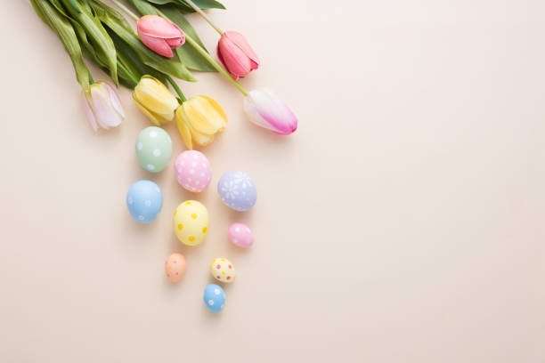 istock Happy Easter day colorful eggs and flower decoration on paper background with copy space 1303467014