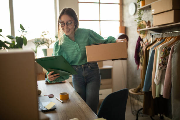 istock Female entrepreneur making sure that everything is prepared for next delivery in her e-commerce shop 1303467184