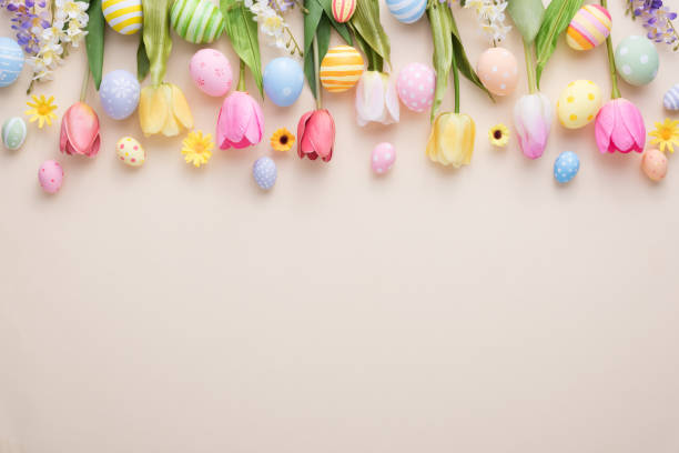 istock Happy Easter day colorful eggs and flower decoration on paper background with copy space 1303467571