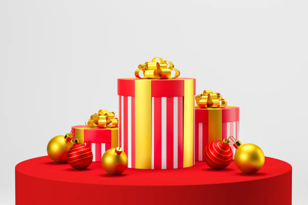 istock Red Christmas gifts on red table over white 1303467833