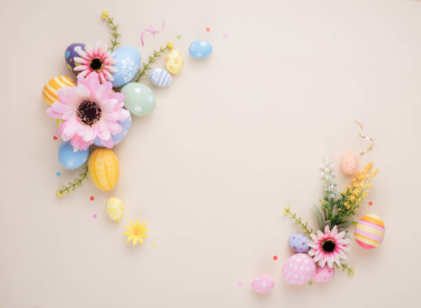 istock Happy Easter day colorful eggs and flower decoration on paper background with copy space 1303467988