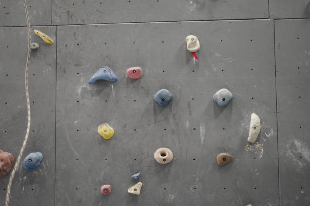 istock climbing holds in gym 1303468815