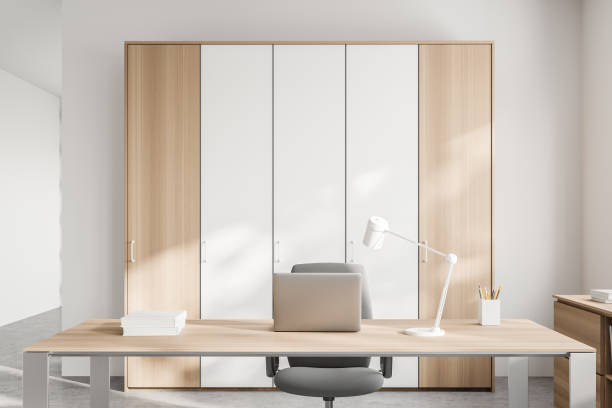 istock White and wooden CEO office interior, close up 1303468968