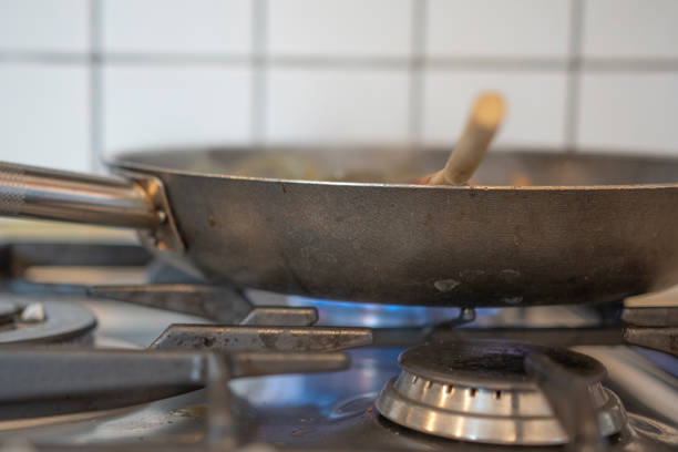 istock Pan on gas stove top 1303476431