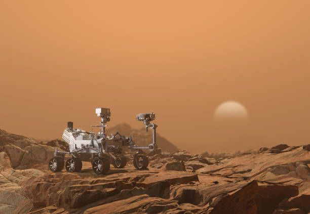 istock Mars Rover Perseverance exploring the red planet. Exploration mission in 2021. Rocky soil and dense, sandy atmosphere. Some elements of this image furnished by NASA. 3d rendering 1303476703